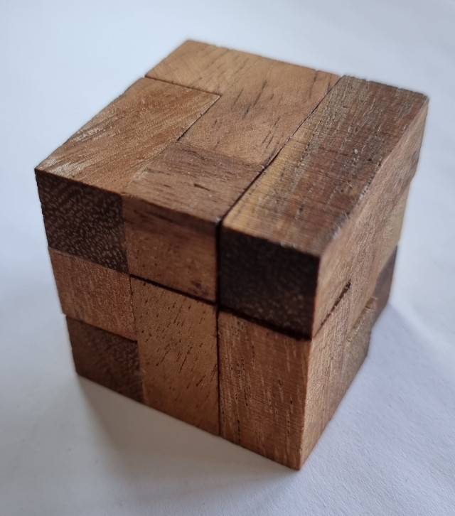 [image: puzzle 3 in target position, a 3x3x3 cube]